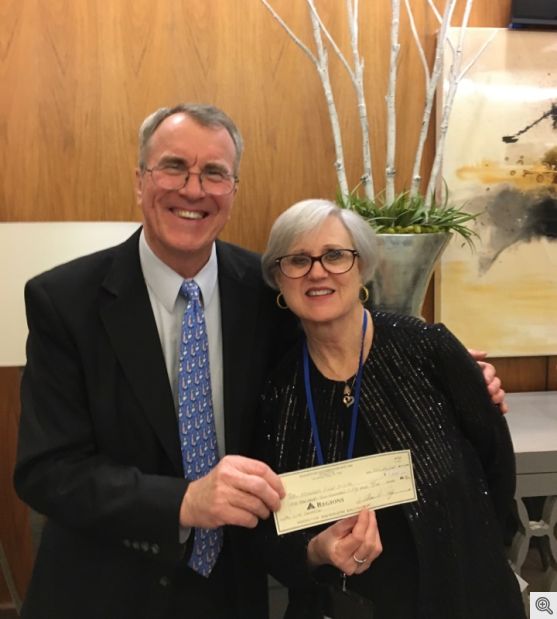 Bob Bowman presents check to Rose Mimms, Director of Arkansas Right to Life